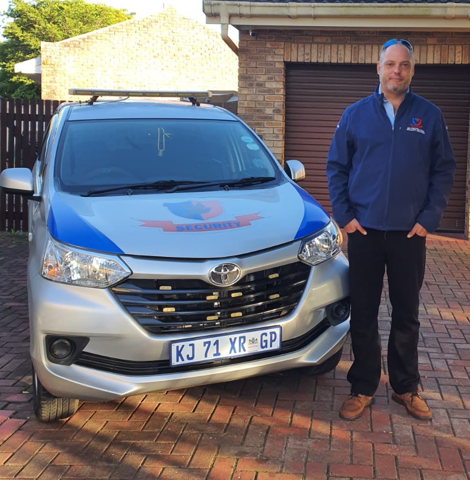 BAPSS team member with residential security vehicle